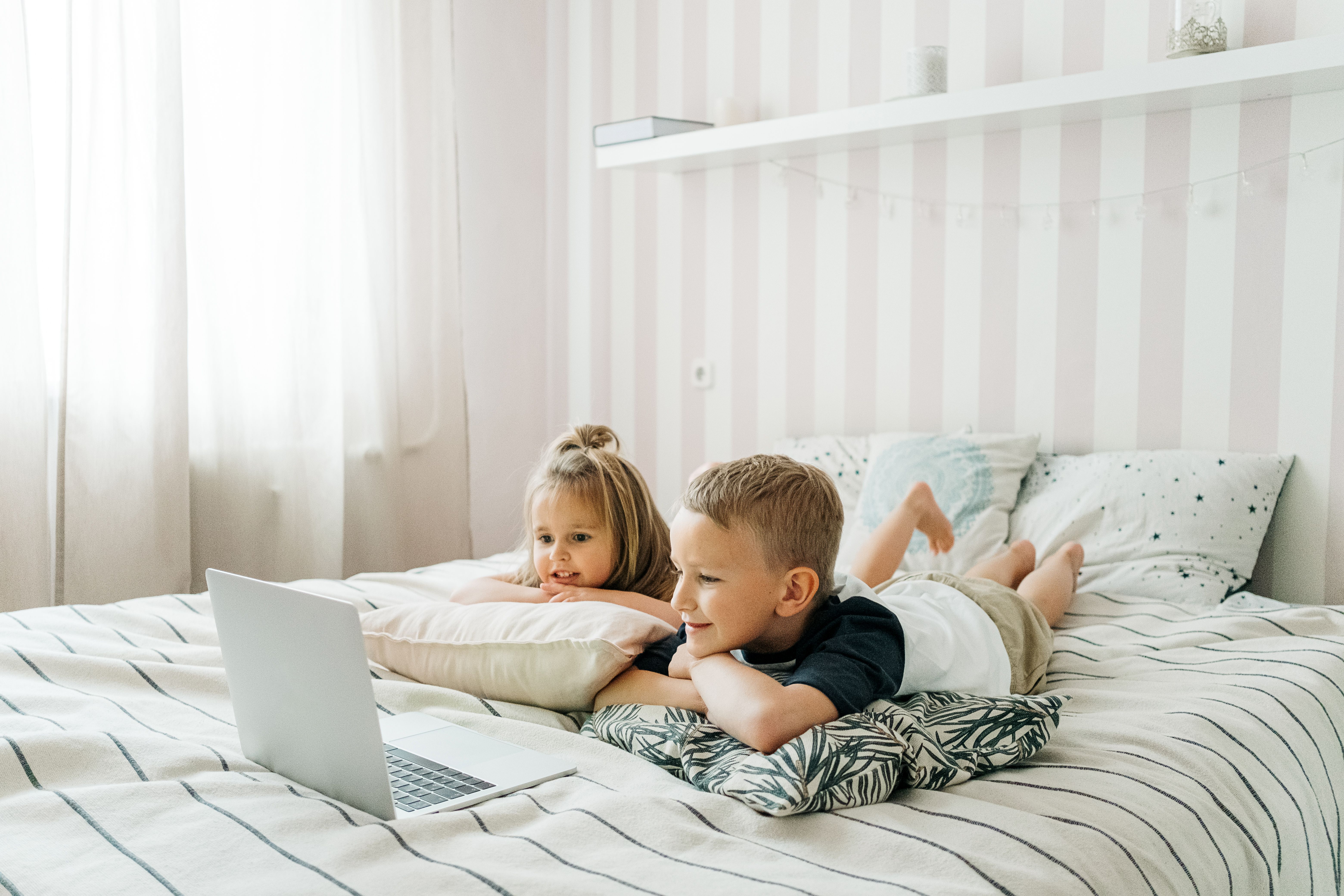 Kids laughing together at a YSA virtual summer camp